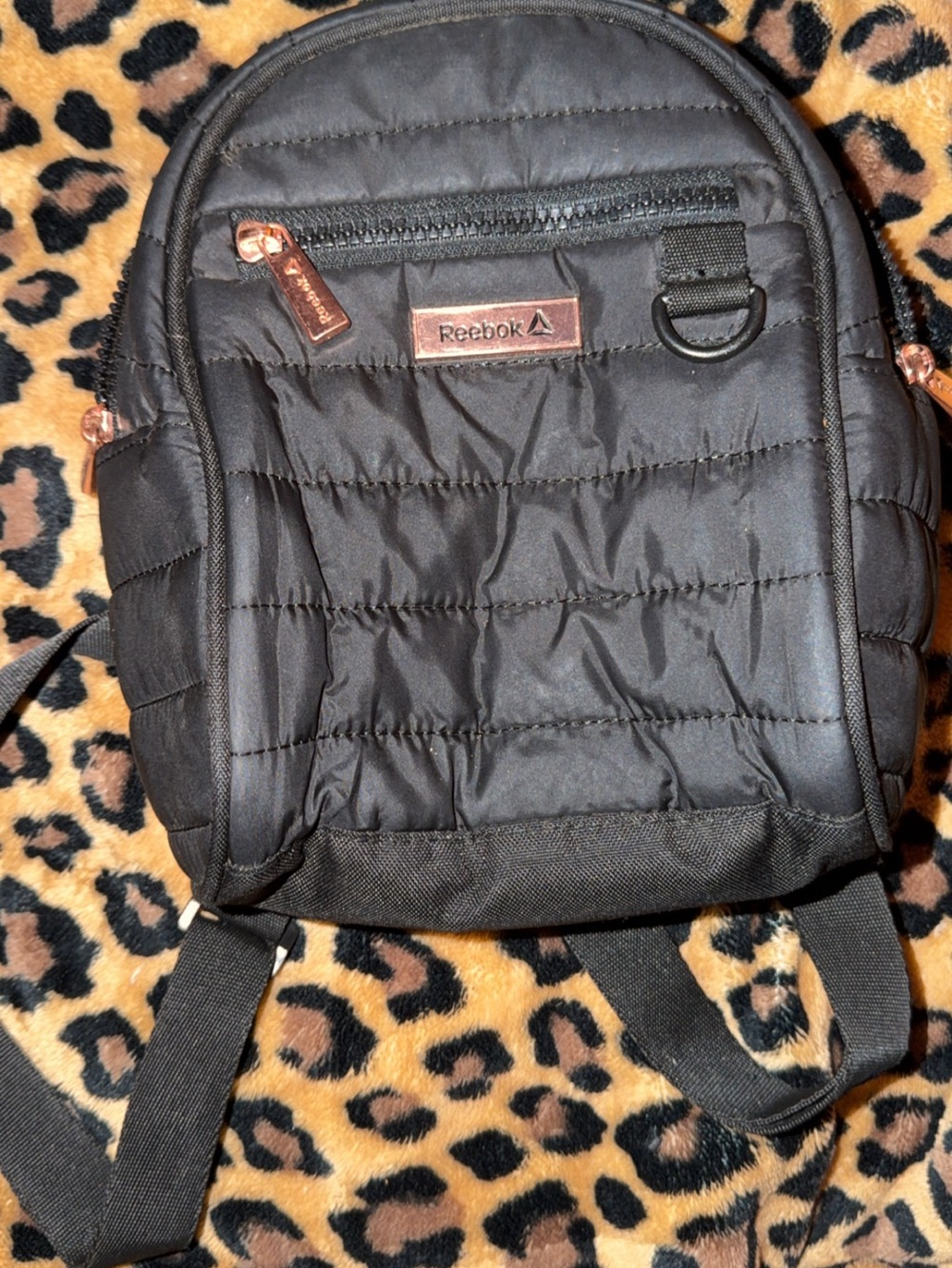 Reebok Black Quilted Backpack with Rose Gold Accents